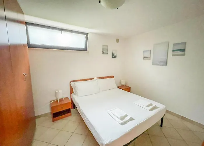 Lägenhet Homiday - Villaggio *