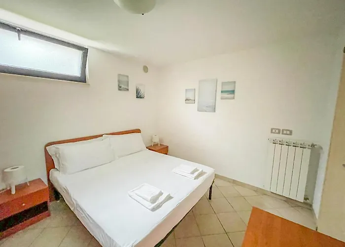 Lägenhet Homiday - Villaggio Pineto